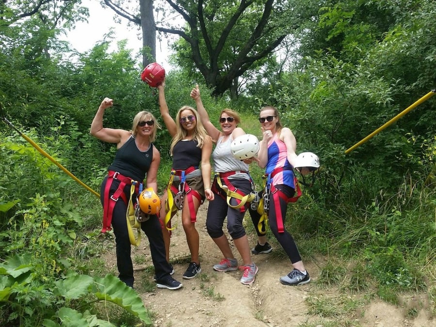 Women celebrating ziplining
