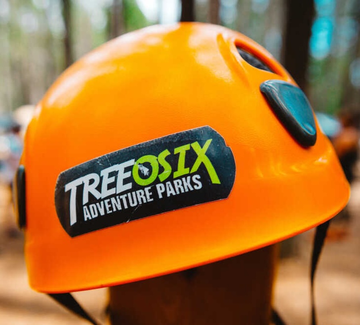 A helmet with a Treeosix sticker